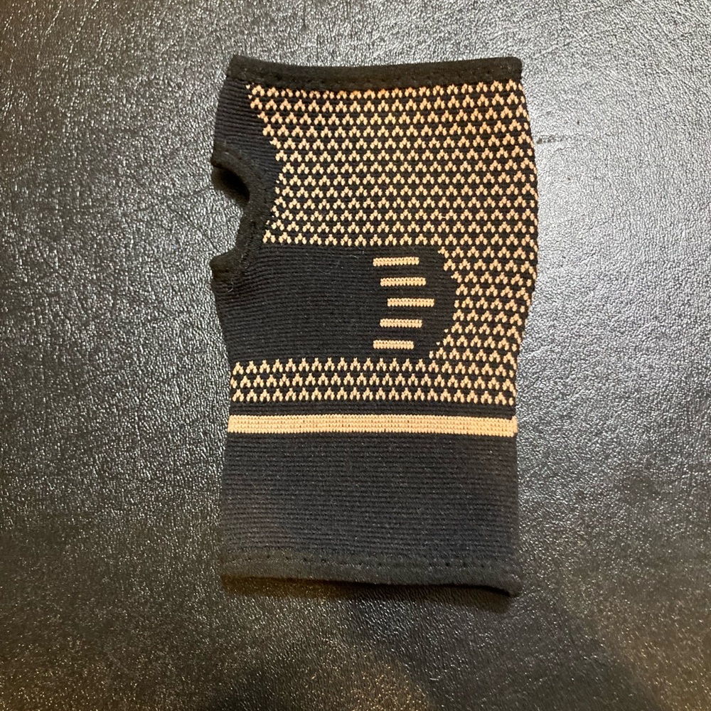 Black and Cream Patterned hand brace